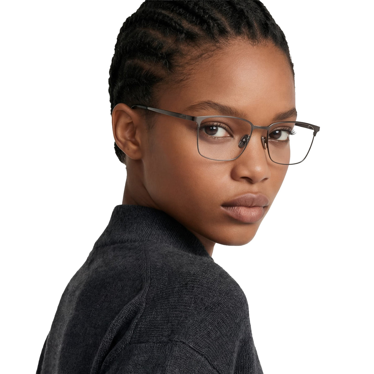 Woman wearing glasses with a neutral background