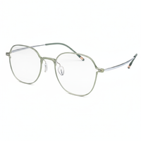 Gold-rimmed eyeglasses on a white background