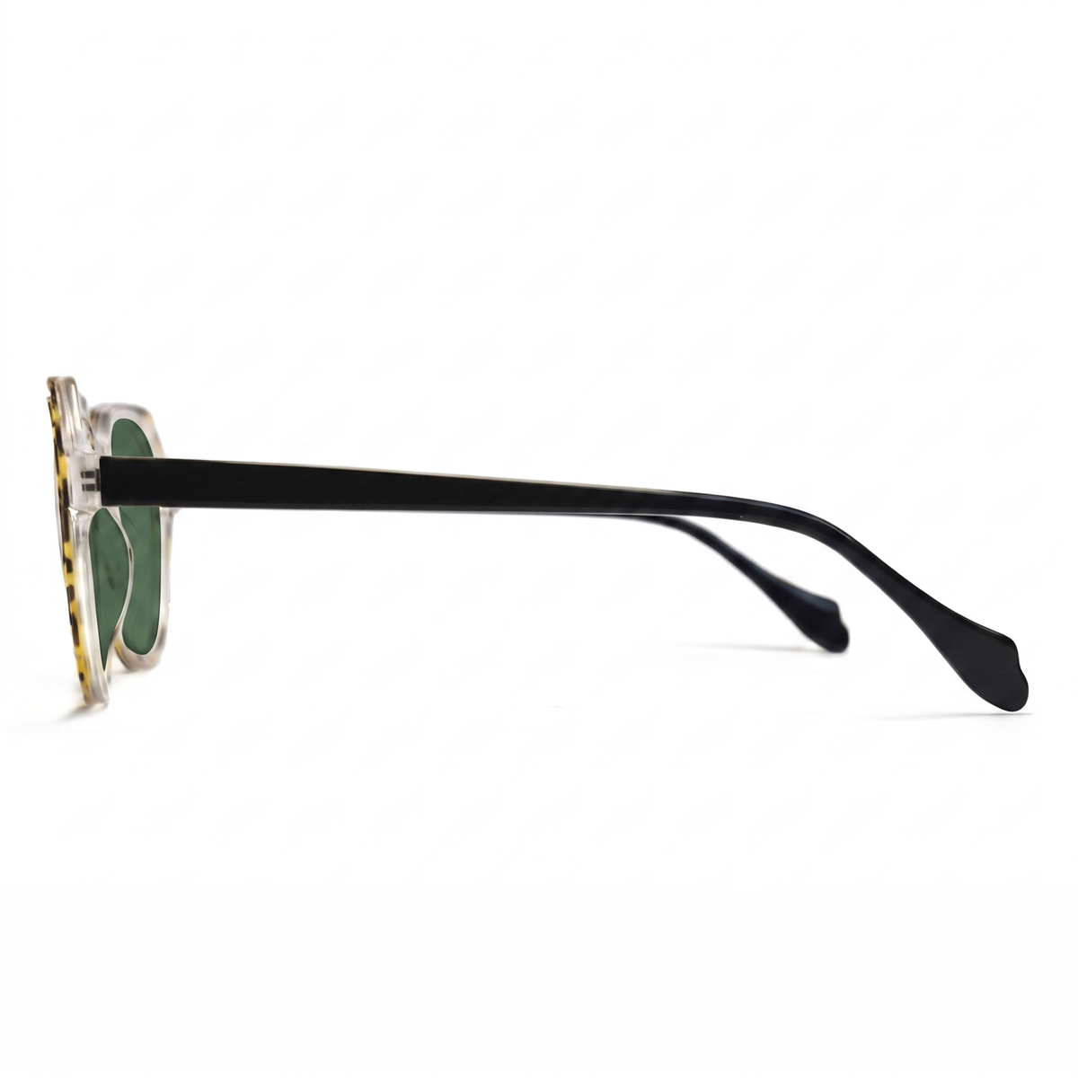 Side profile of a pair of sunglasses with a clear acetate frame featuring a gold tortoiseshell pattern, green lenses, and black temple arms, shown on a white background.