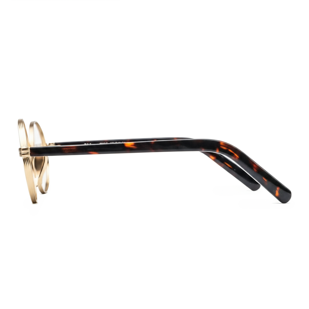 Eyeglasses with tortoiseshell frame and gold accents on a white background