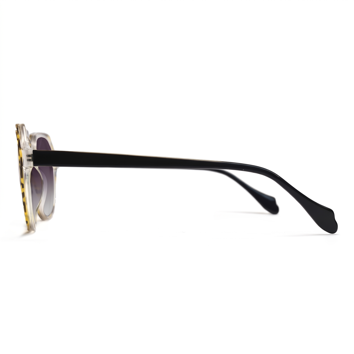 Side profile of a pair of sunglasses with a gold and black tortoiseshell frame, black temples, and dark lenses on a white background.