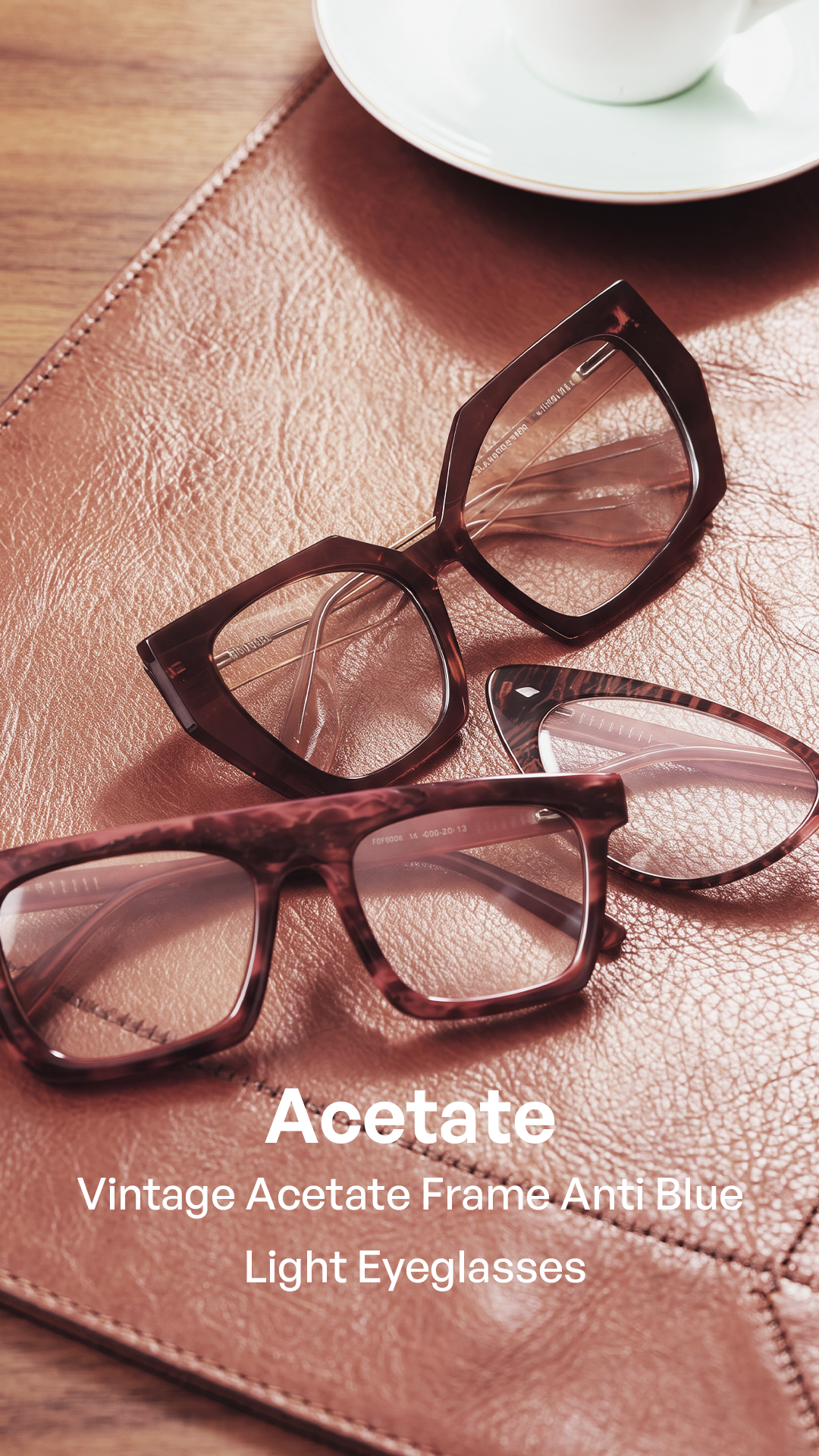 Three pairs of vintage acetate eyeglasses with tortoiseshell and cat-eye frames, arranged on a brown textured leather surface with a white cup in the background. Text overlay reads 'Acetate Vintage Acetate Frame Anti Blue Light Eyeglasses'.