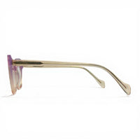 Sunglasses with gold frame and pink gradient lenses on a white background