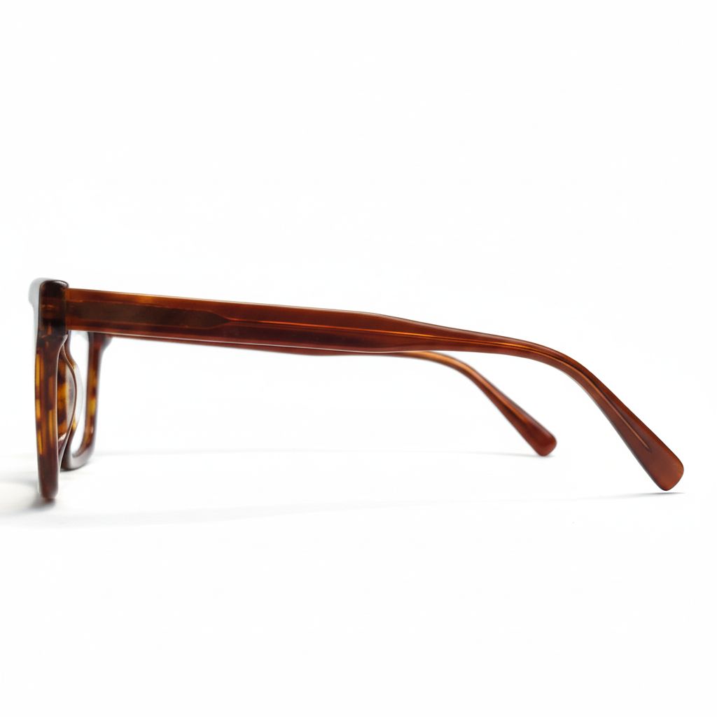 Brown tortoiseshell eyeglasses on a white background