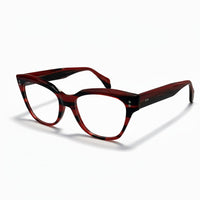 Red and black eyeglasses on a white background