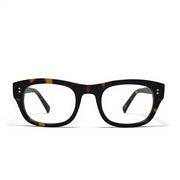 Tortoiseshell eyeglasses on a white background