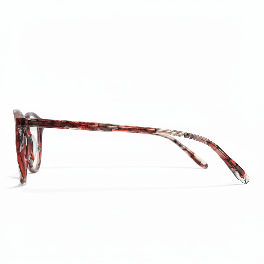 Red and black tortoiseshell eyeglasses on a white background