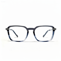 Blue-tinted eyeglasses on a white background