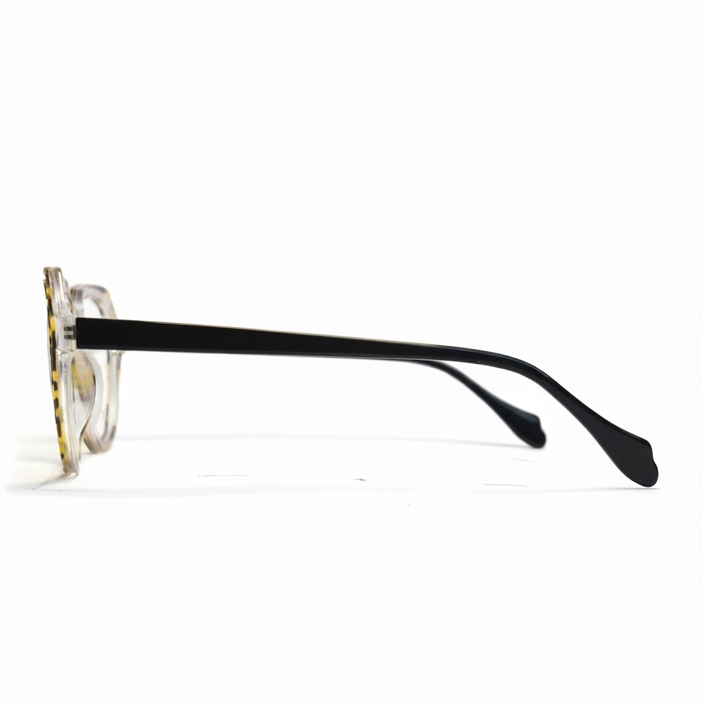 Eyeglasses with a clear frame and black arm on a white background