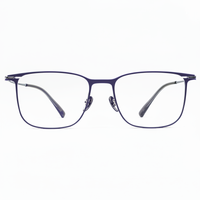 Pair of eyeglasses with a blue frame on a white background