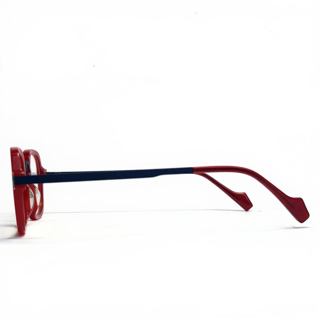 Eyeglasses with red and blue frame on a white background