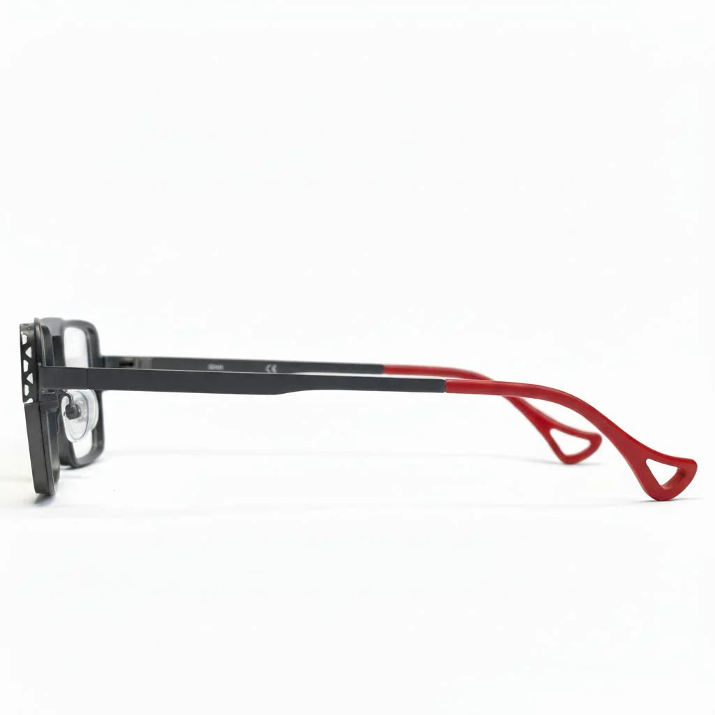 Eyeglasses with black frame and red arms on a white background