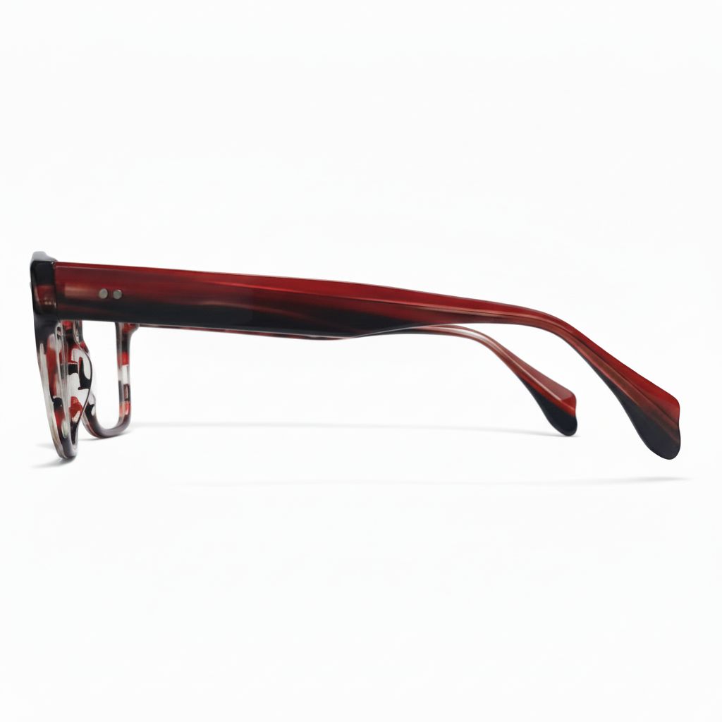 Red and black eyeglasses on a white background
