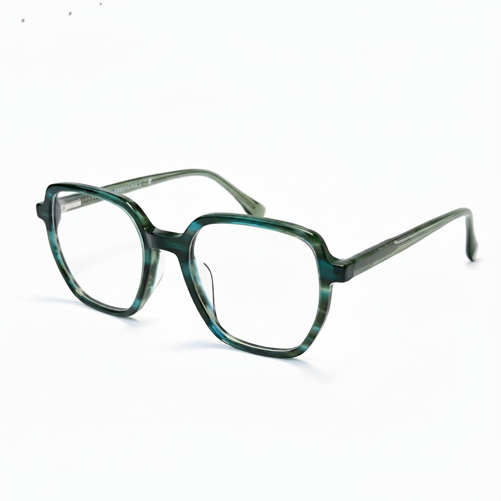 Green eyeglasses on a white background