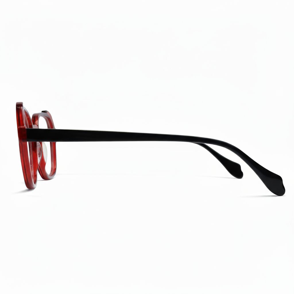 Eyeglasses with red frame and black arms on a white background