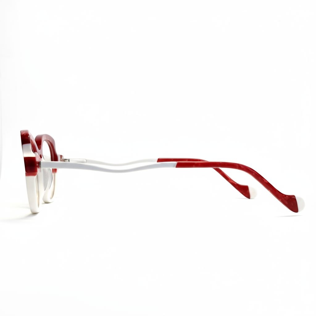 Eyeglasses with red and white frame on a white background