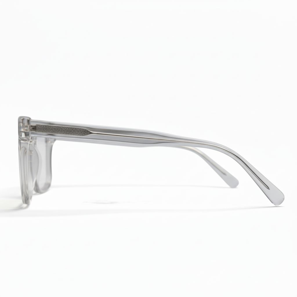 Clear sunglasses with a thin metallic frame on a white background