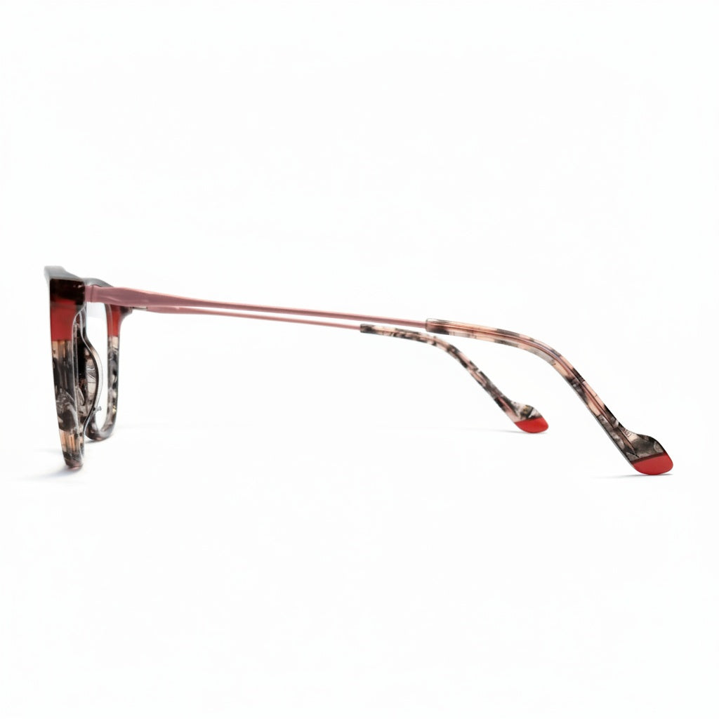 Eyeglasses with a tortoiseshell and red design on a white background