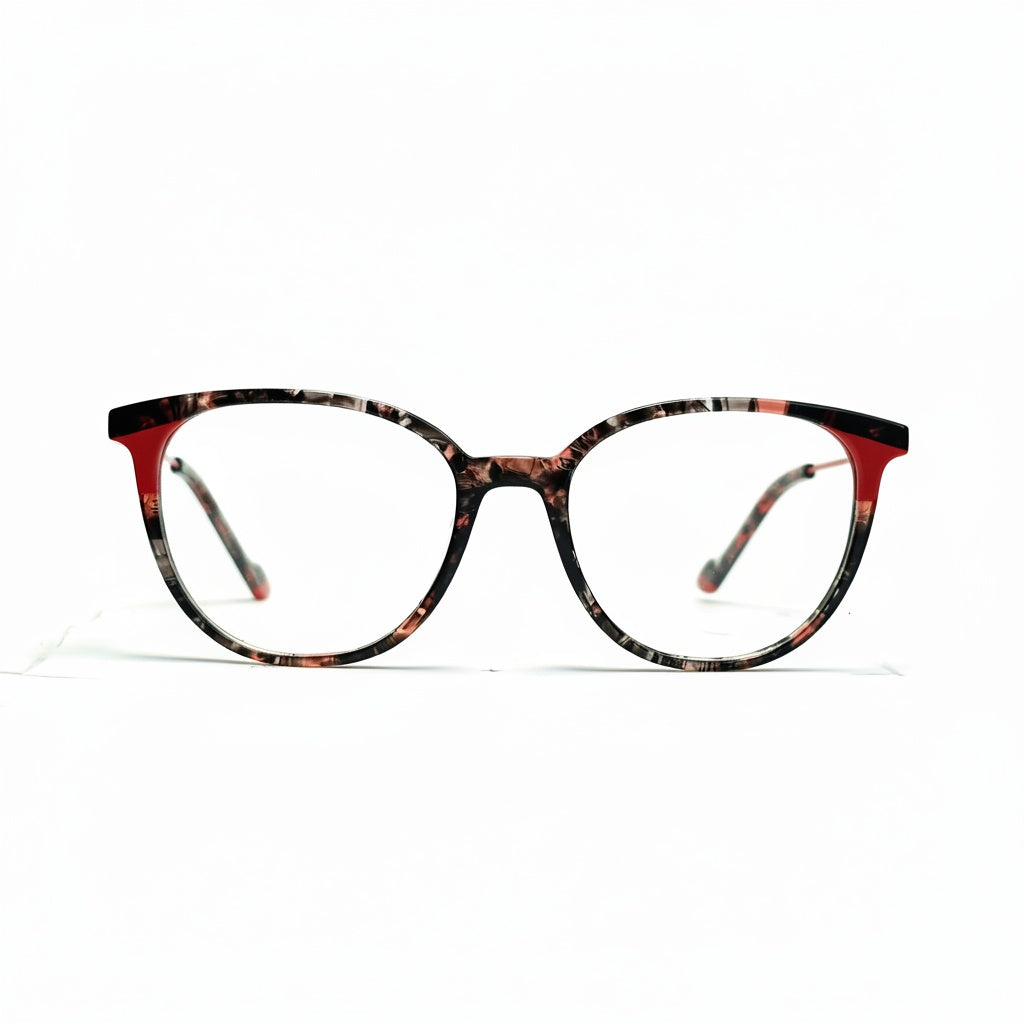 Cat-eye glasses with a tortoiseshell and red frame on a white background