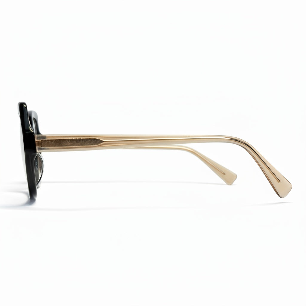 Sunglasses with black frame and gold arms on a white background