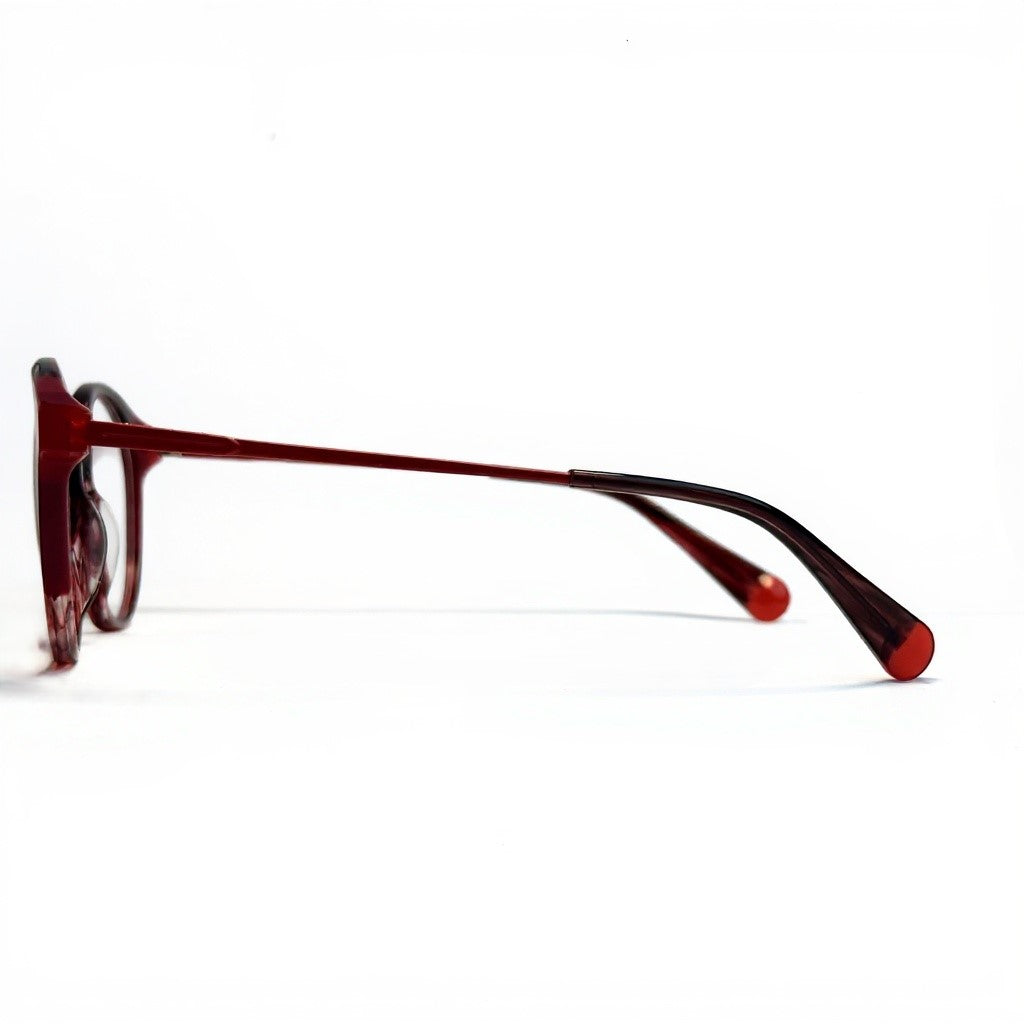 Red eyeglasses on a white background