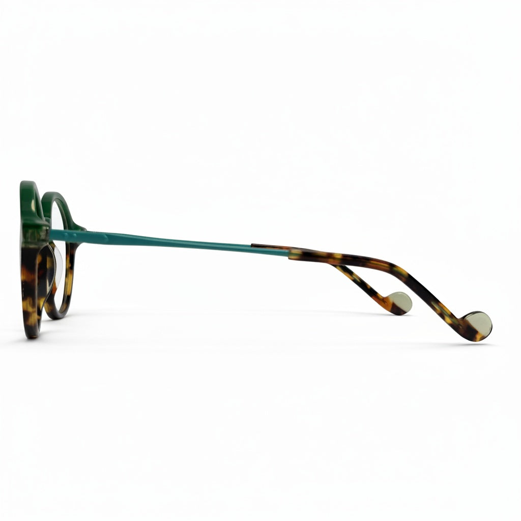 Green and tortoiseshell eyeglasses on a white background