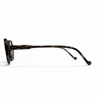 Tortoiseshell eyeglasses on a white background