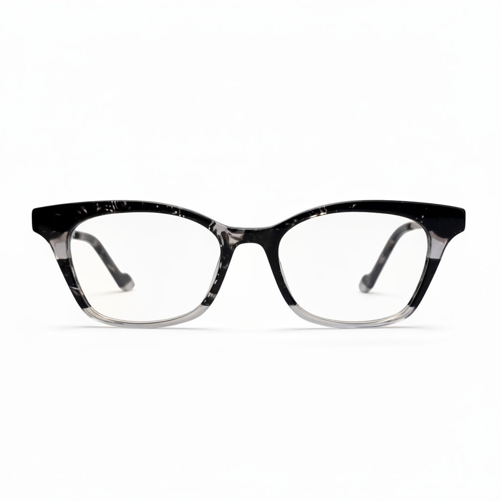 Black and clear cat-eye glasses on a white background