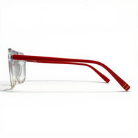 Red eyeglasses with clear arms on a white background