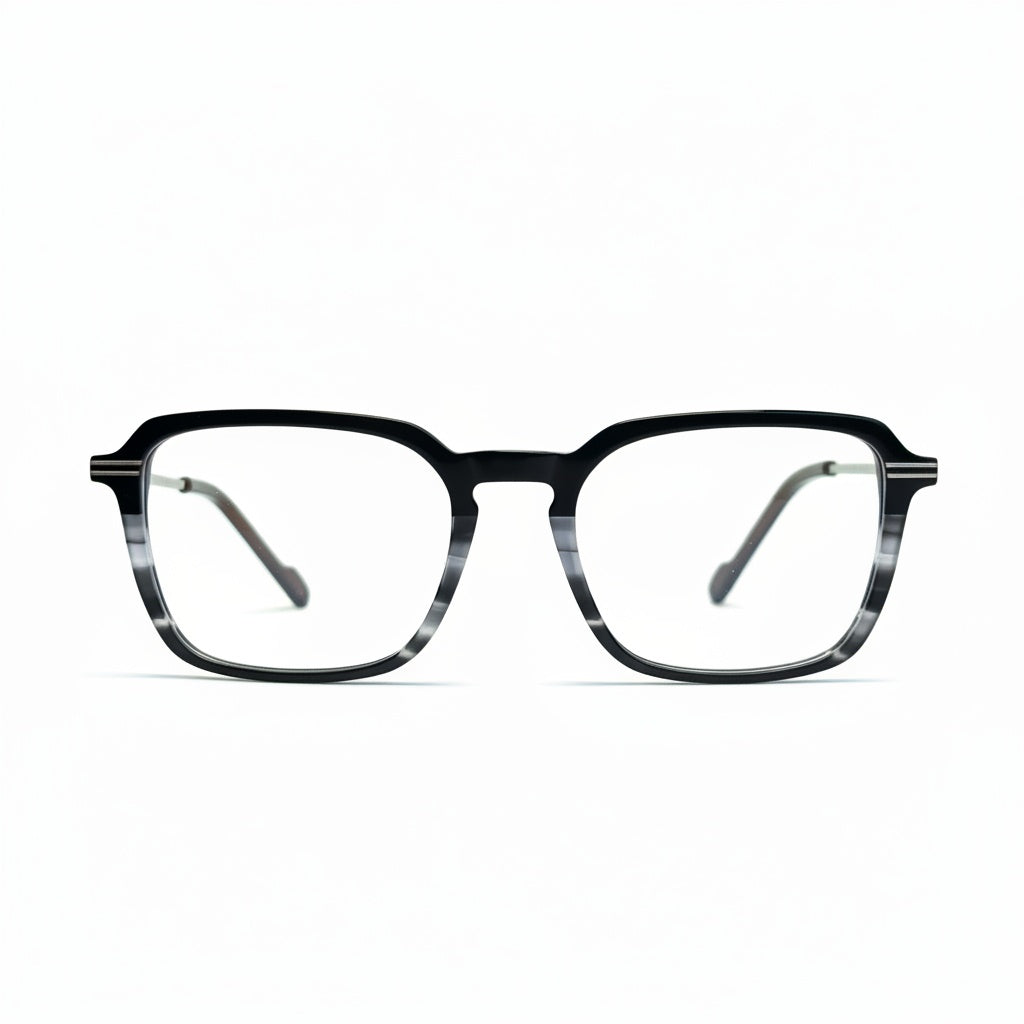 Black and gray striped eyeglasses on a white background