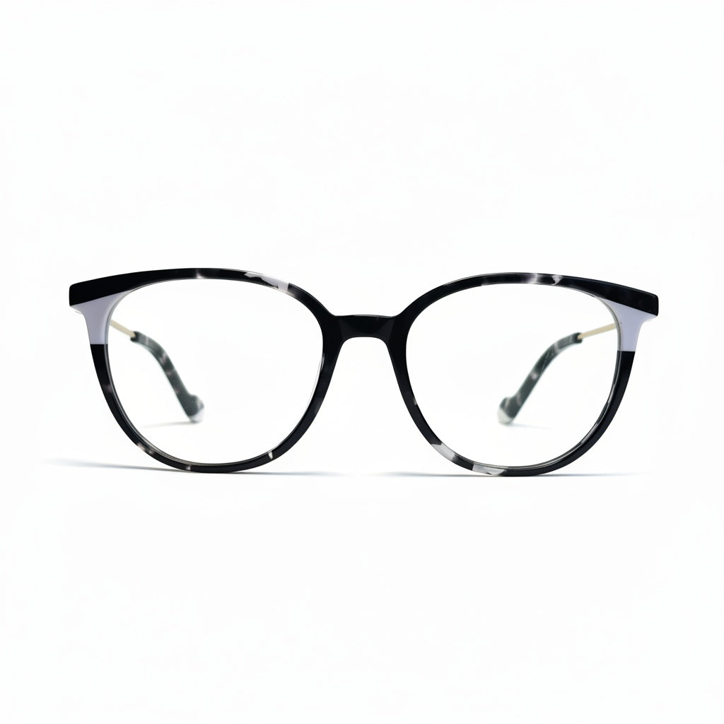 Black and white tortoiseshell eyeglasses on a white background