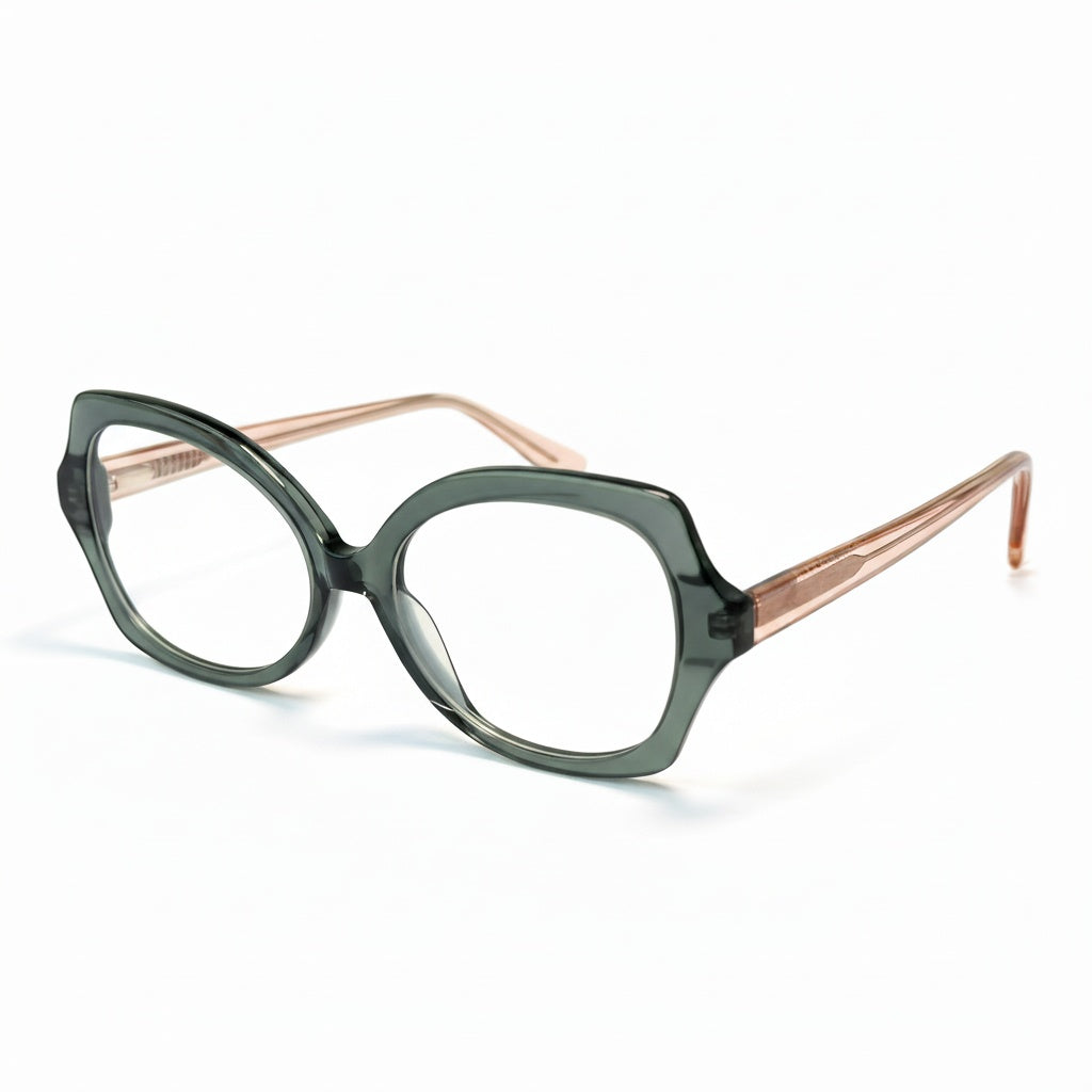 Green eyeglasses with rose gold accents on a white background