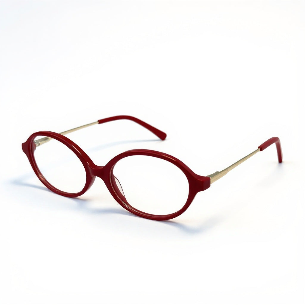 Red eyeglasses with gold accents on a white background
