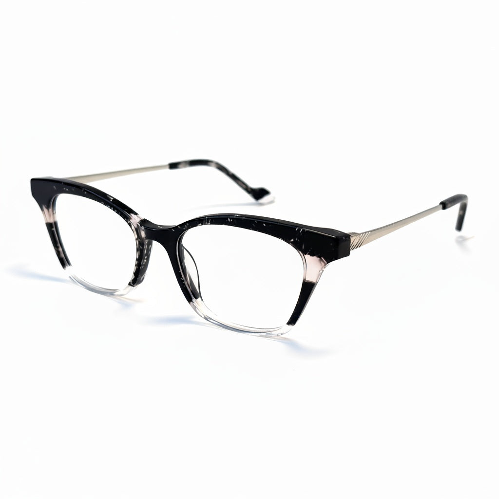 Black and gold cat-eye glasses on a white background