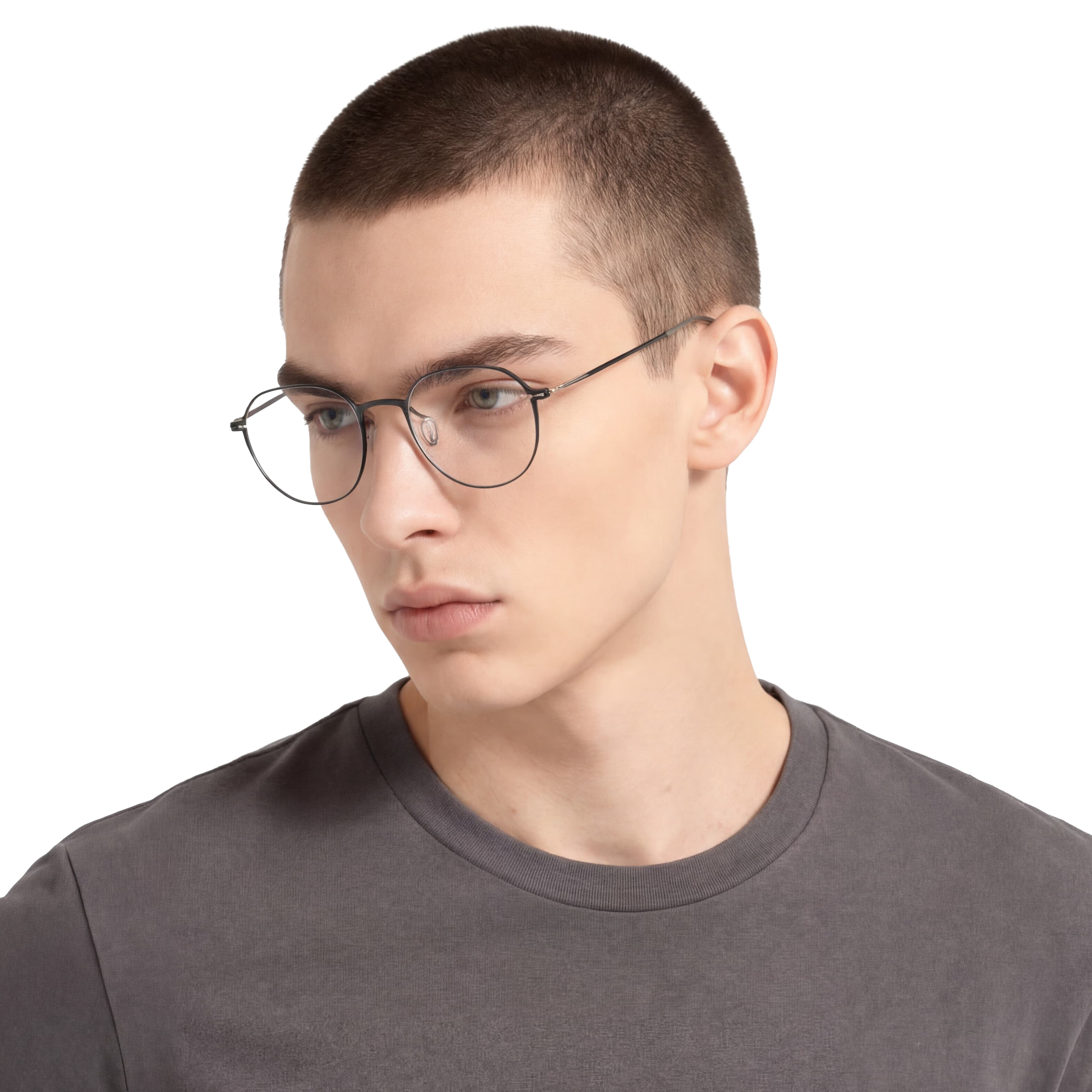 Person wearing glasses and a gray shirt on a white background