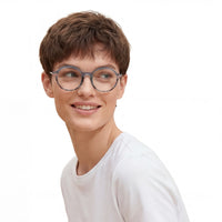 Person wearing glasses and a white shirt on a white background