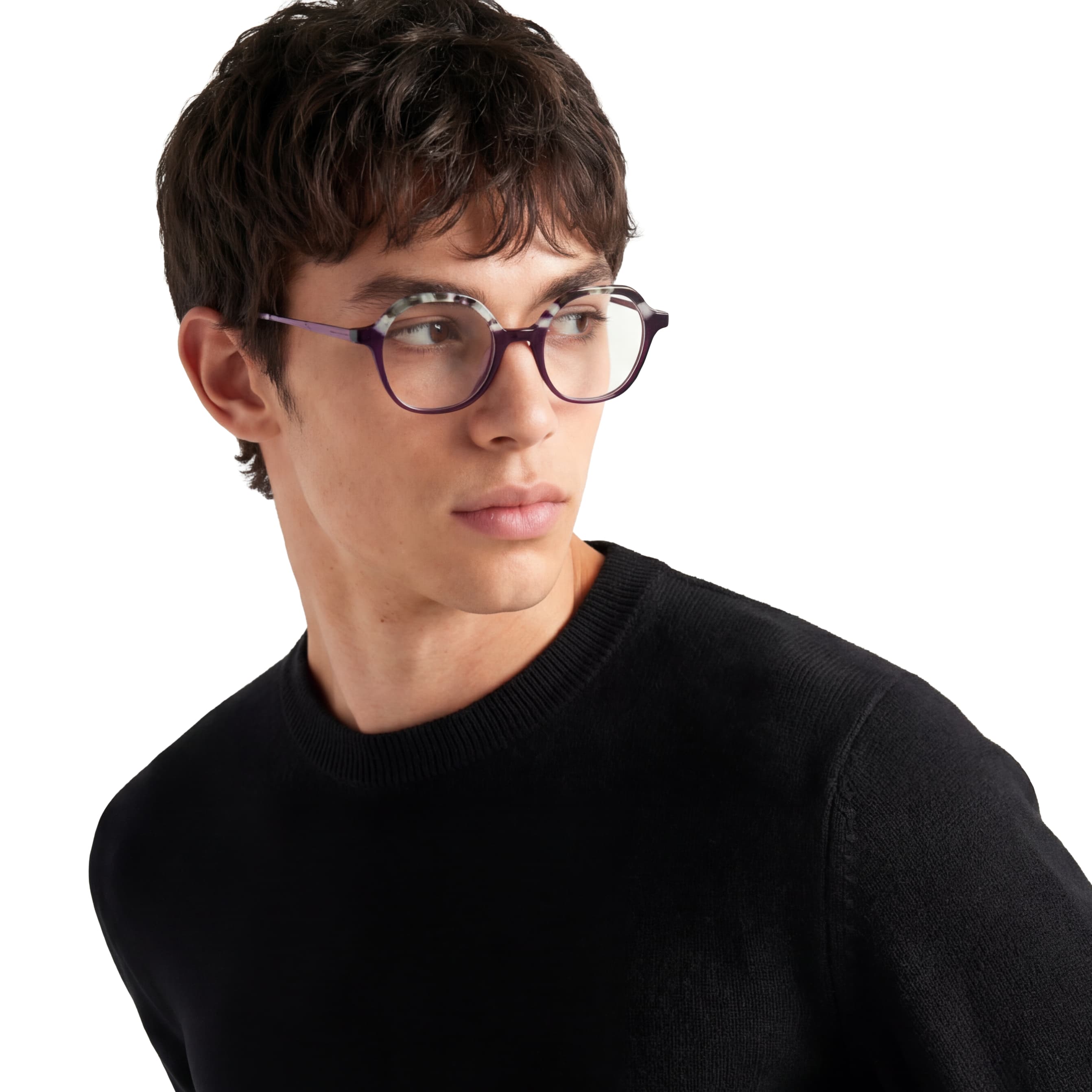 Person wearing a black sweater and purple eyeglasses on a white background