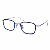 Eyeglasses with blue frames on a white background