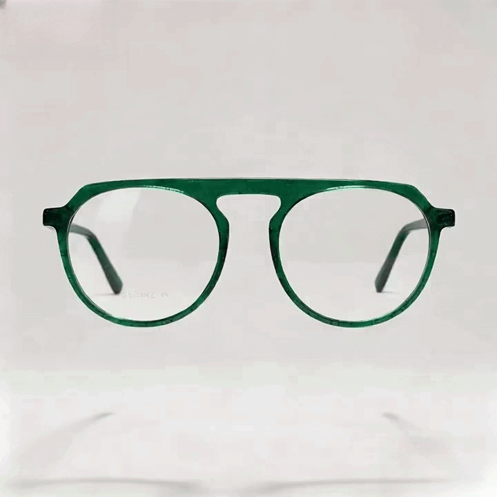 Transparent emerald green acetate double bridge aviator eyeglasses frame, white studio background