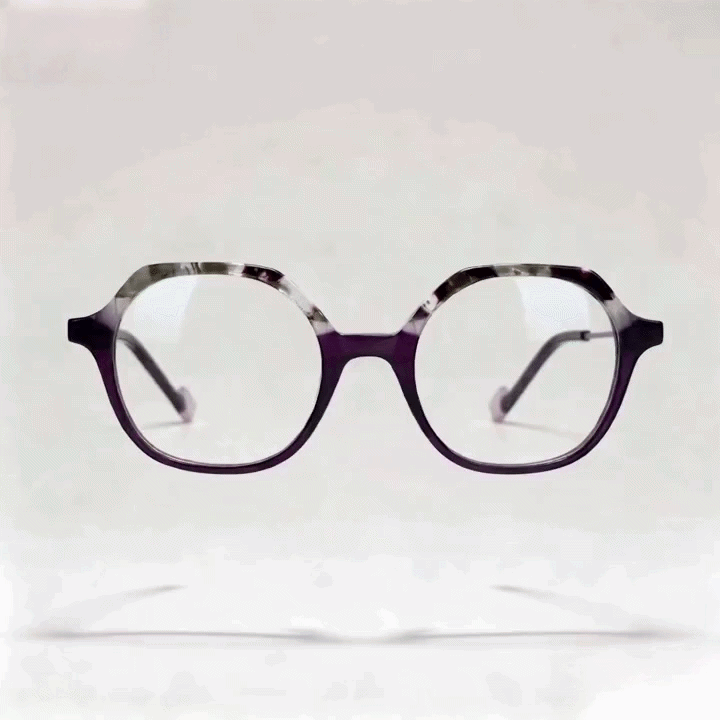 Purple tortoise octagonal acetate eyeglasses frame, white studio background