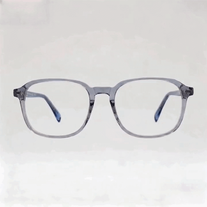Rotating product GIF of translucent clear square eyeglasses with gradient deep blue temple arms, clear prescription lenses, shot against plain light gray seamless background, animated spinning product asset for Shopify eyewear listing.