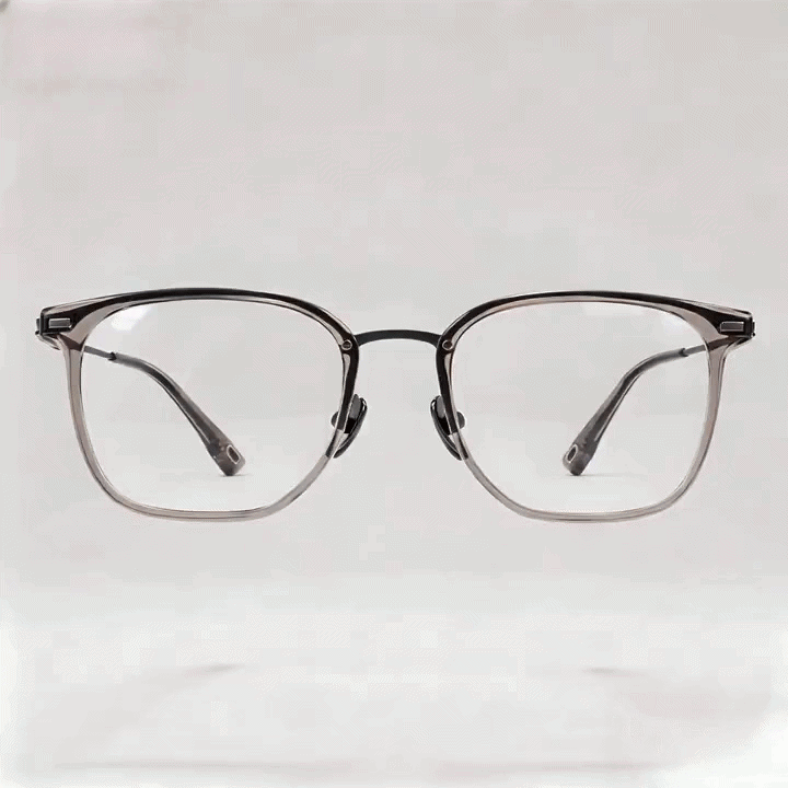 Transparent gray tortoise square acetate eyeglasses frame, white studio background