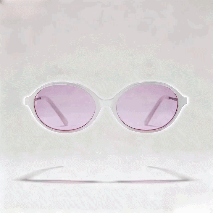 Transparent white oval acetate sunglasses frame with light pink tint lenses, light gray studio background; right side overlay Windows Optimization Master pop-up window