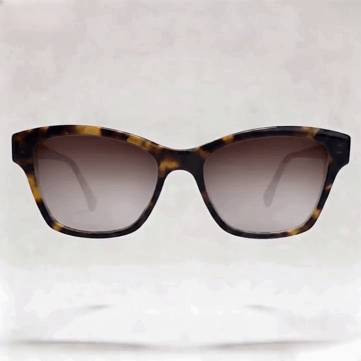 Tortoise cat-eye acetate sunglasses with gradient brown lenses studio shot