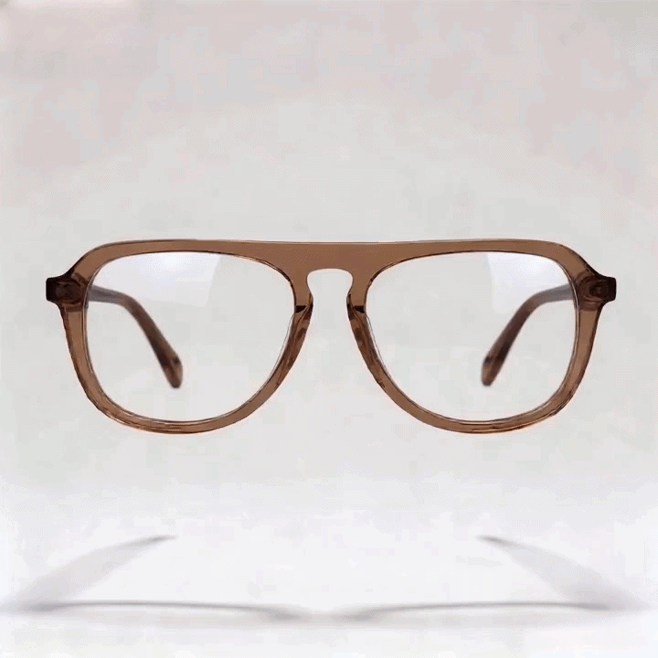 Transparent brown double-bridge aviator acetate eyeglasses frame, white studio background