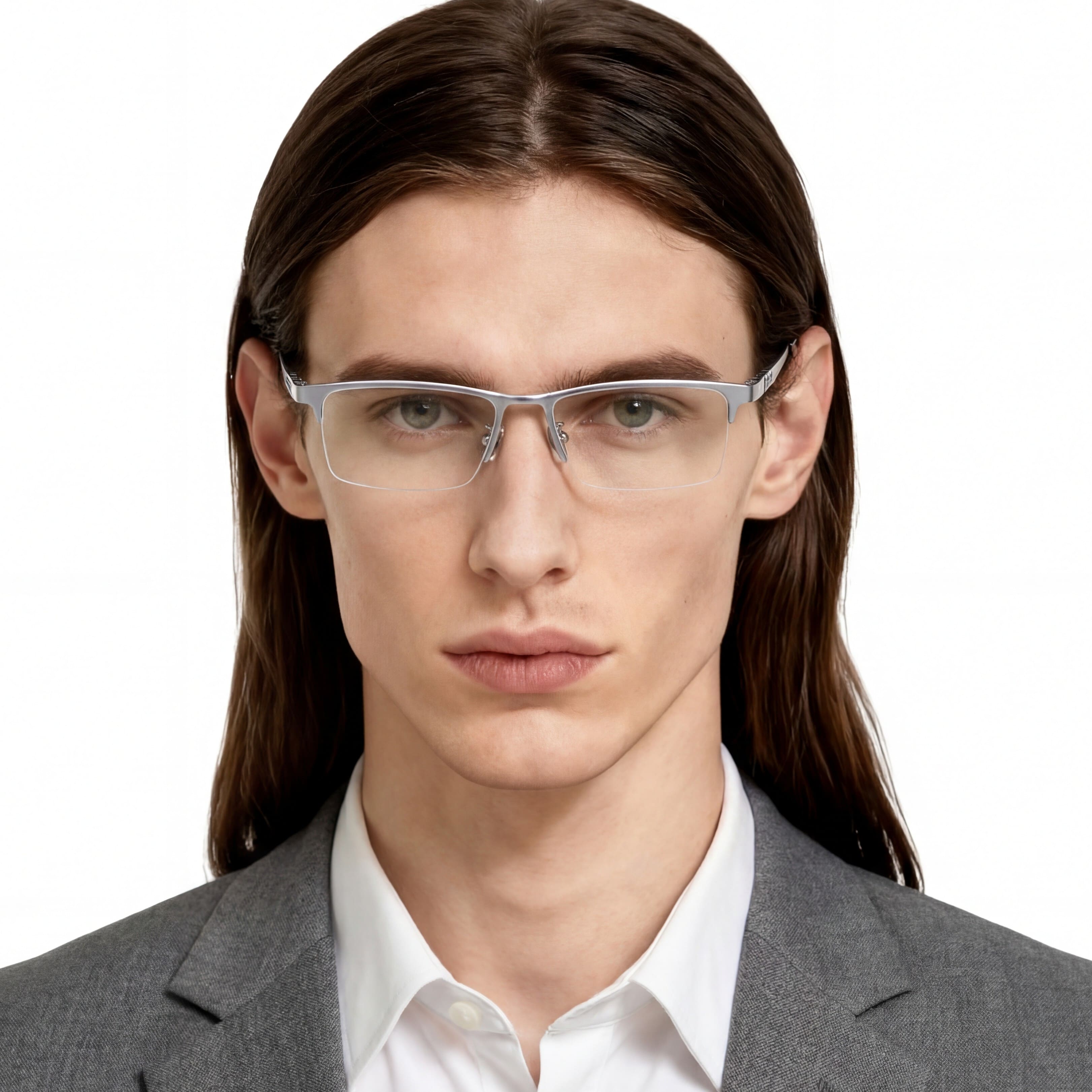Person wearing glasses with a plain background