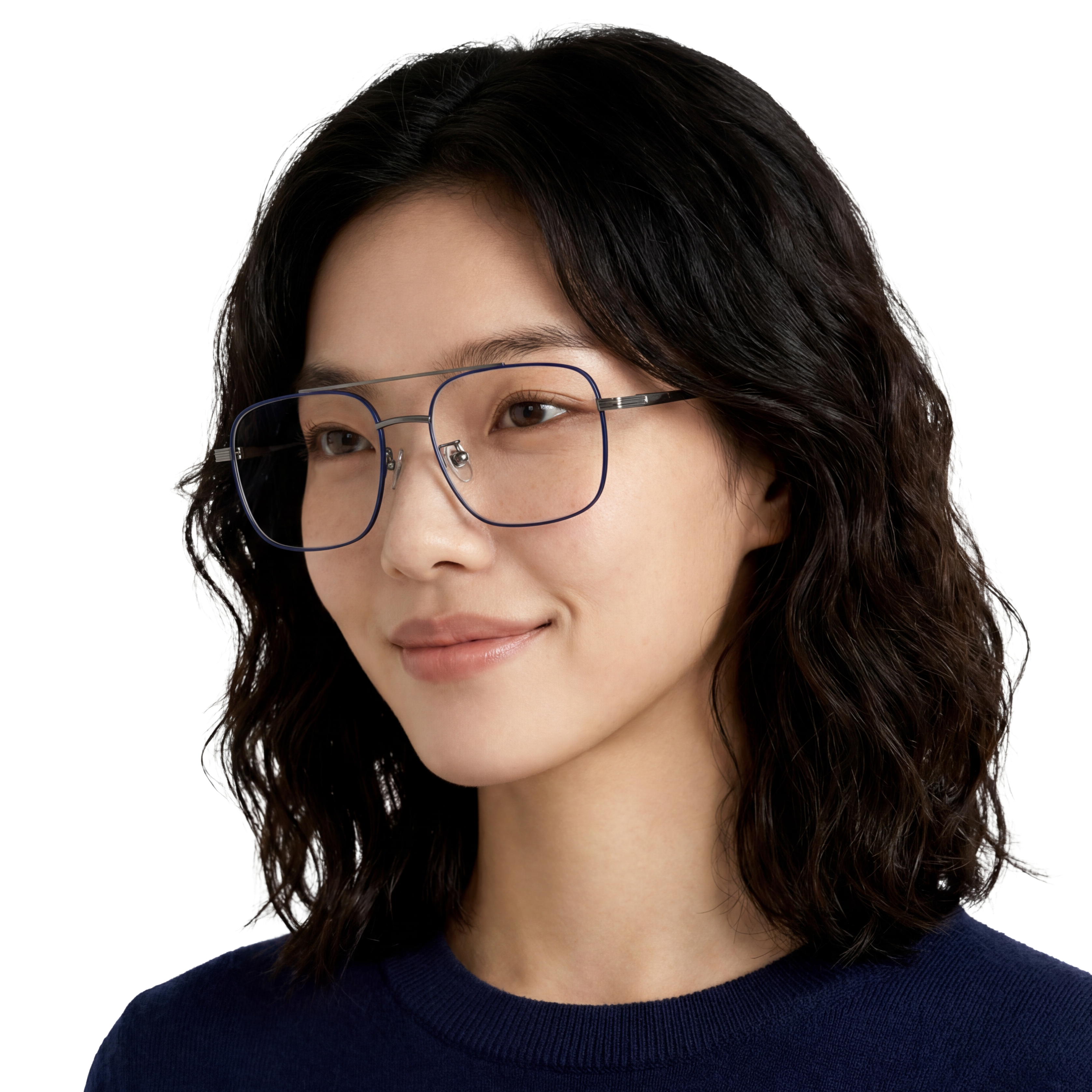 Woman wearing glasses with a plain background